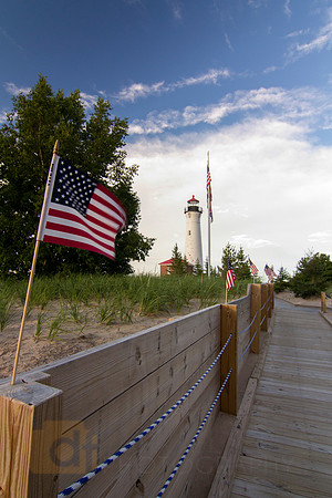 Crisp Point Lighthouse and American Flags